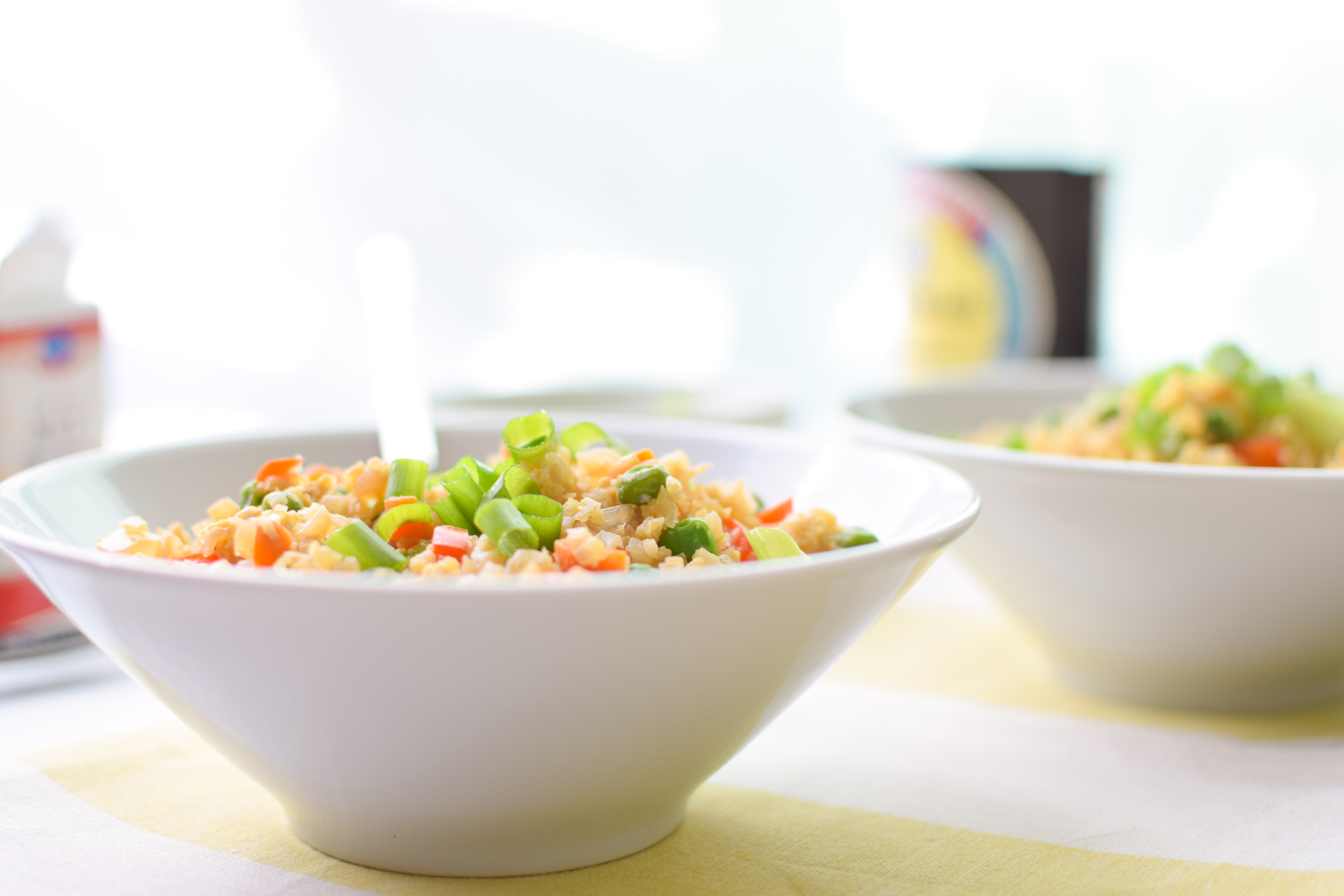 Fried Cauliflower Rice Recipe - Super healthy takeout style fried "rice", made with cauliflower! Packed with veggies and easy to personalize. - ProjectMealPlan.com