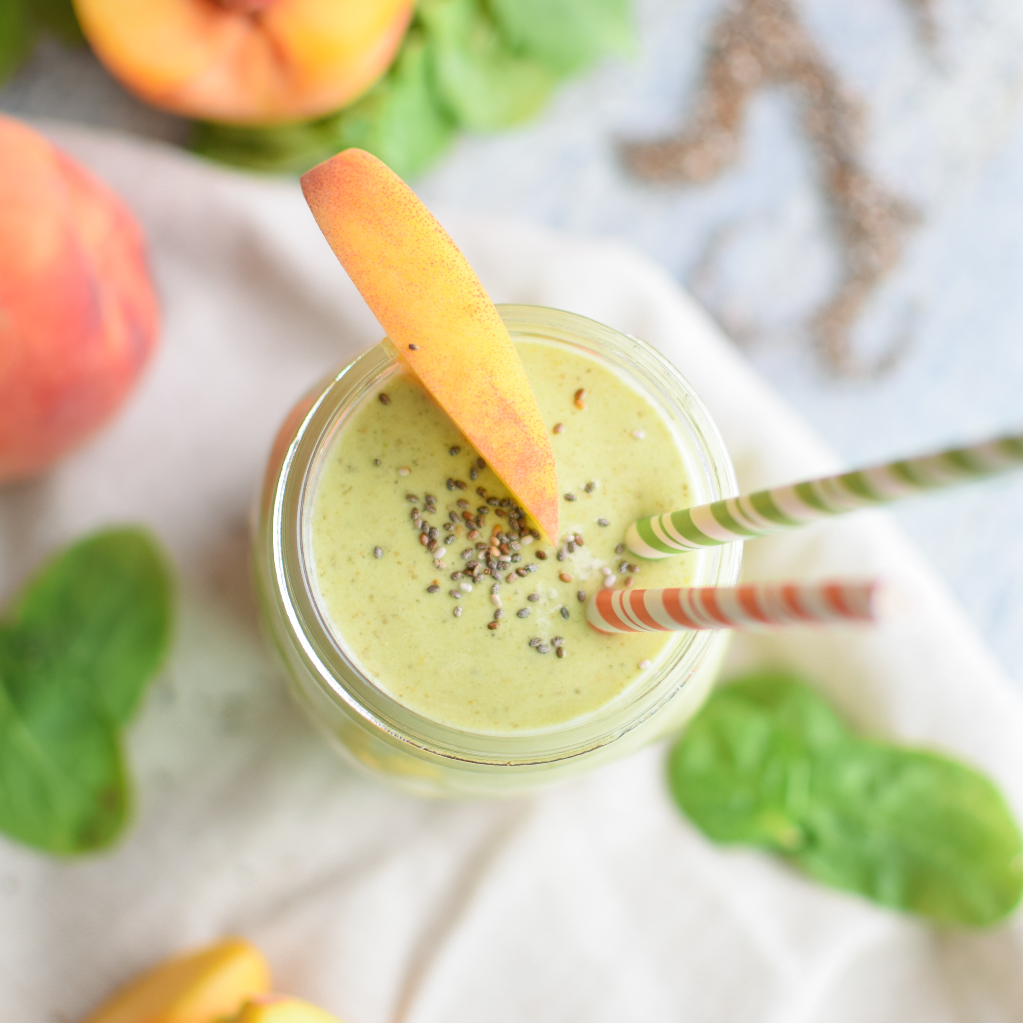 Peaches and Green Protein Smoothie recipe - power greens, peaches, bananas plus protein! Easy smoothie recipe on ProjectMealPlan.com!