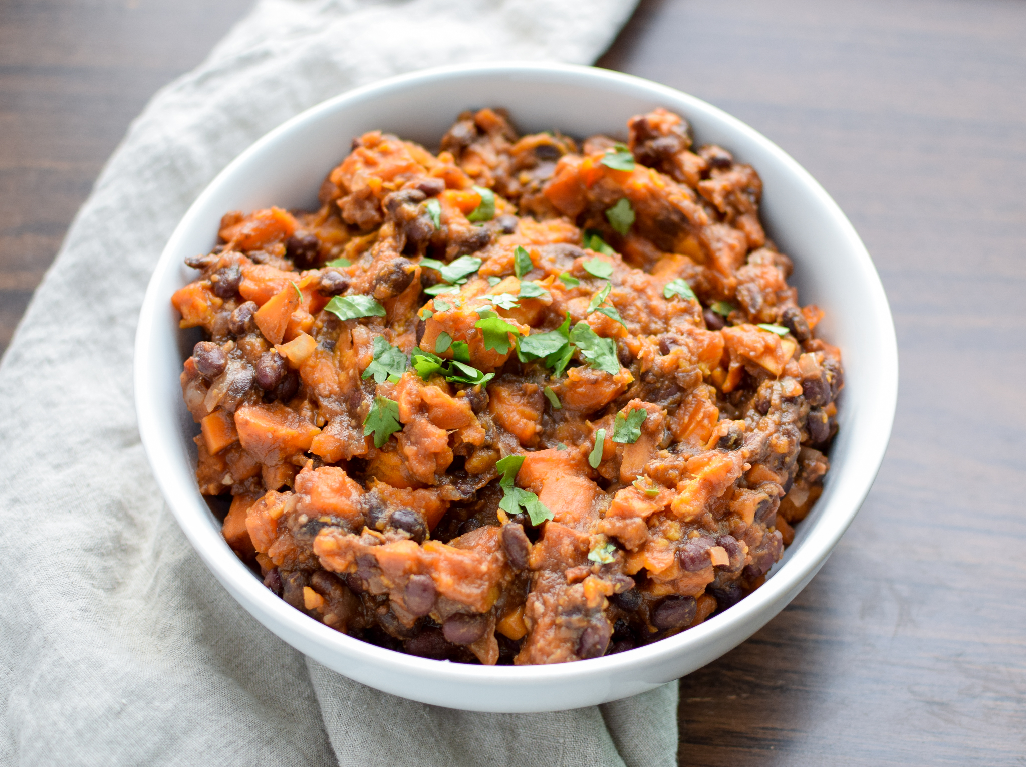 BBQ Black Bean Slow Cooker Sweet Potatoes - Black beans, sweet potatoes, and spicy BBQ sauce. A match made in side dish heaven! - ProjectMealPlan.com