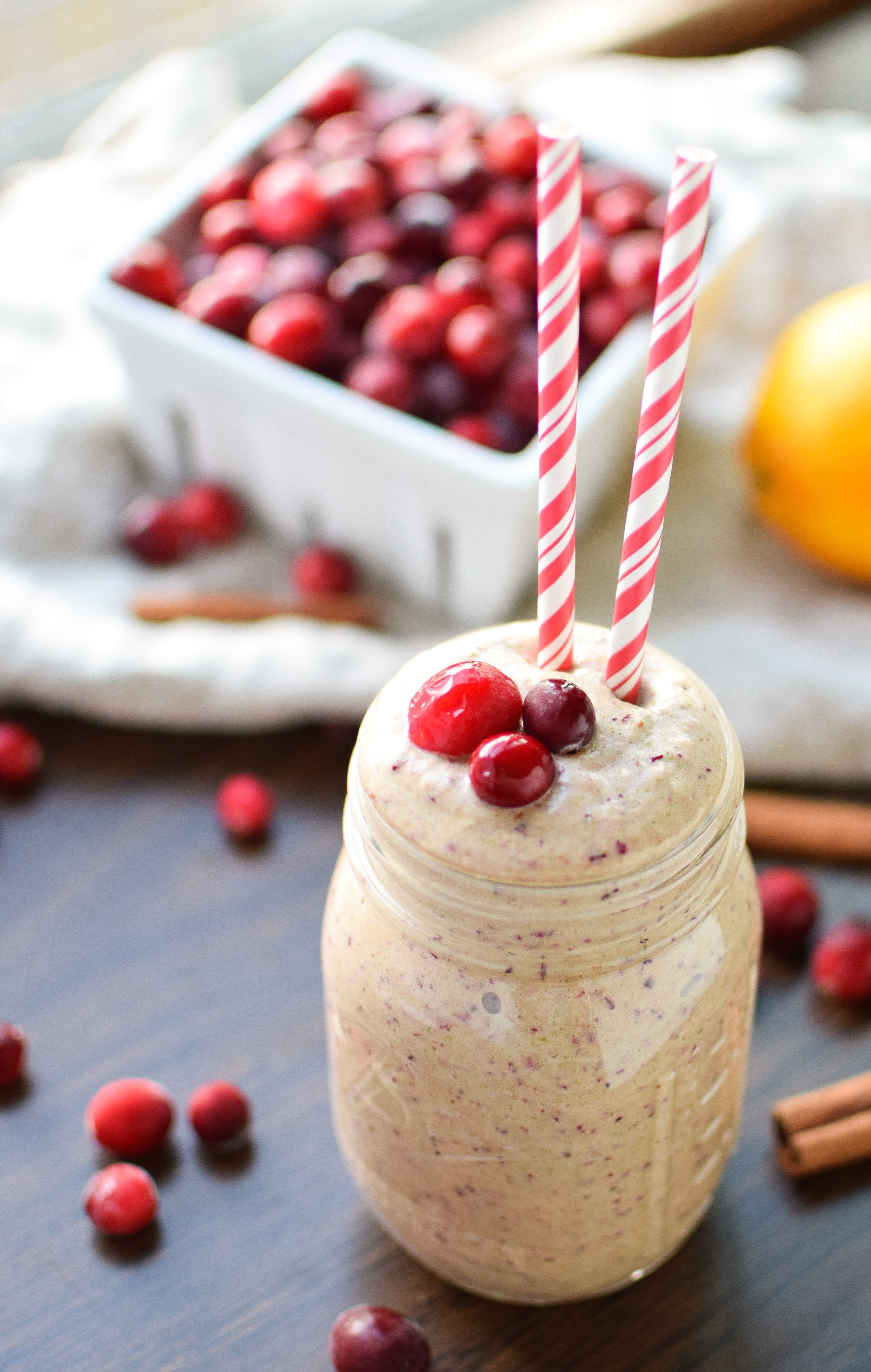 Orange Cranberry Greens Protein Smoothie recipe - You MUST try this new smoothie with happy Fall flavors - orange, cranberry, and CINNAMON make this creamy breakfast (or lunch!) complete! - ProjectMealPlan.com