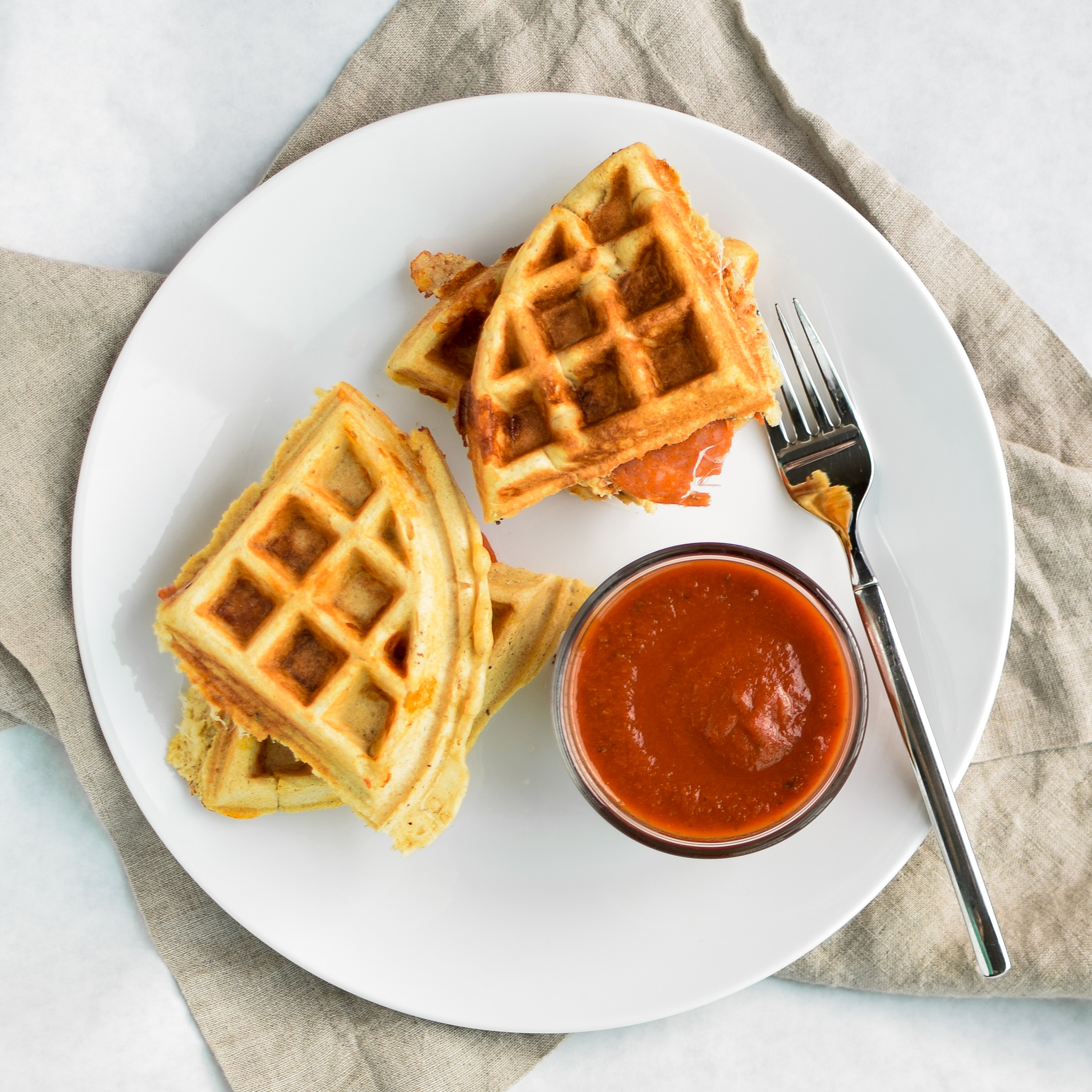 Protein Packed Pepperoni Pizza Waffles - Pizza + Waffles made super easy at home! Stuffed with mozzarella and pepperoni, plus packed with protein! - ProjectMealPlan.com