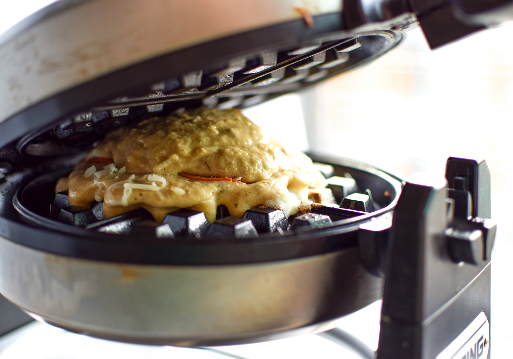 Protein Packed Pepperoni Pizza Waffles - Pizza + Waffles made super easy at home! Stuffed with mozzarella and pepperoni, plus packed with protein! - ProjectMealPlan.com