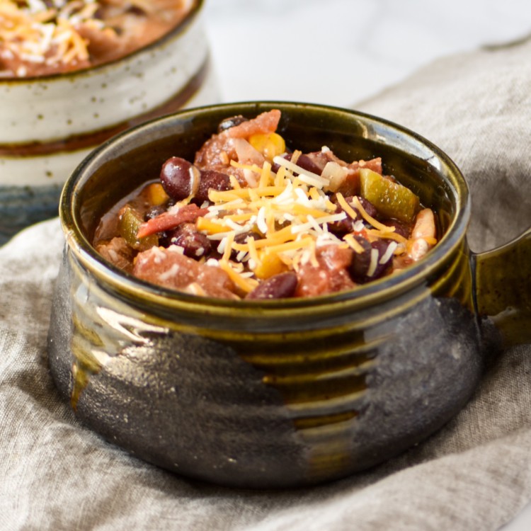 Easy Crockpot Chicken Thigh Taco Chili - Super easy crock pot taco chili to help clear out your pantry! Set it and forget it :) - ProjectMealPlan.com