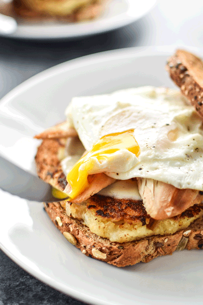 Ultimate Leftover Turkey Breakfast Sandwich - The best use of your holiday leftovers! Stuffing, mashed potatoes, turkey, topped with a fried egg! - ProjectMealPlan.com