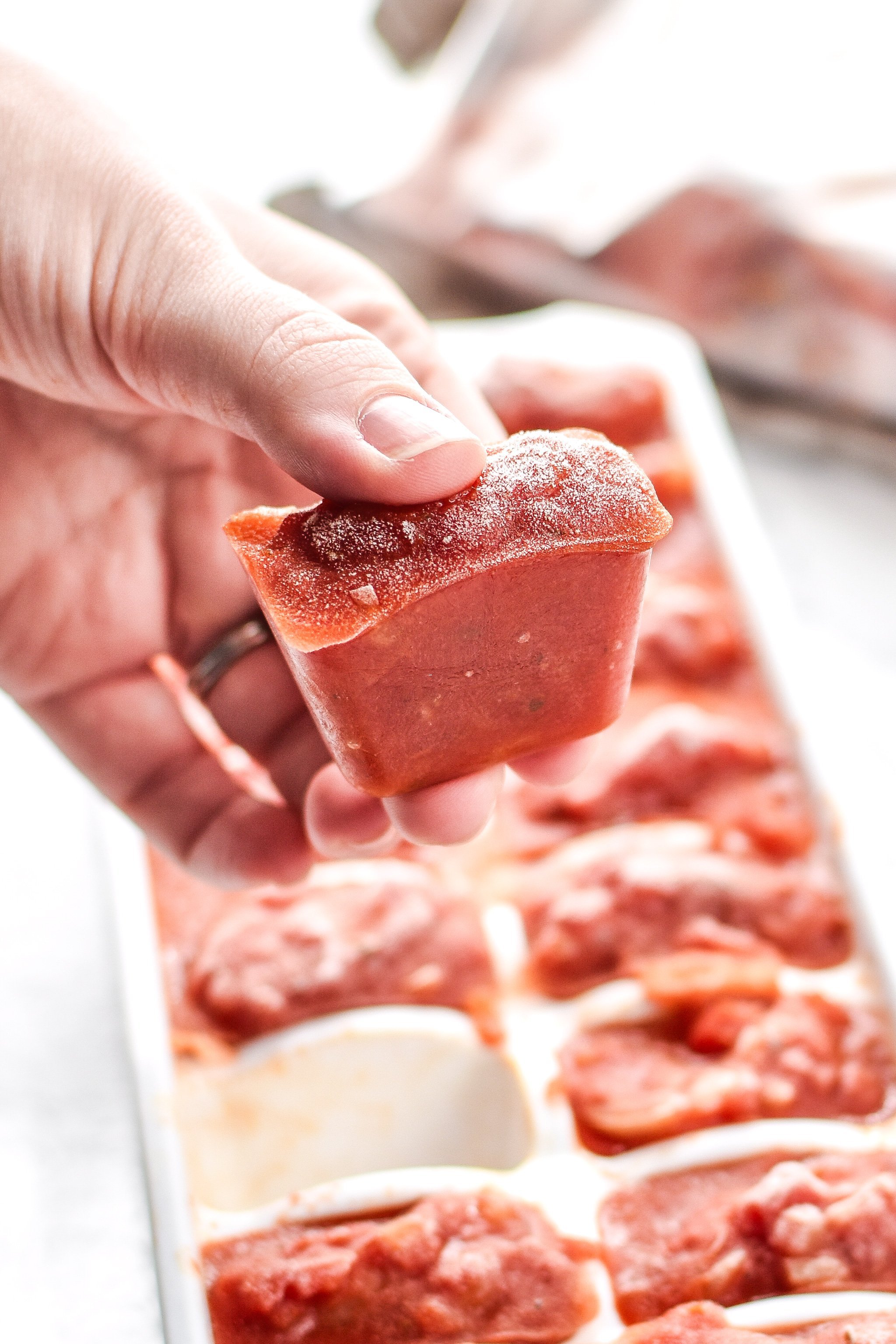 Ice cubes of homemade pizza sauce