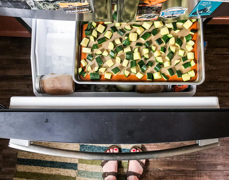 Here's how big my freezer is. Broth is frozen in mason jars and I'm freezing zucchini chunks on a baking sheet.