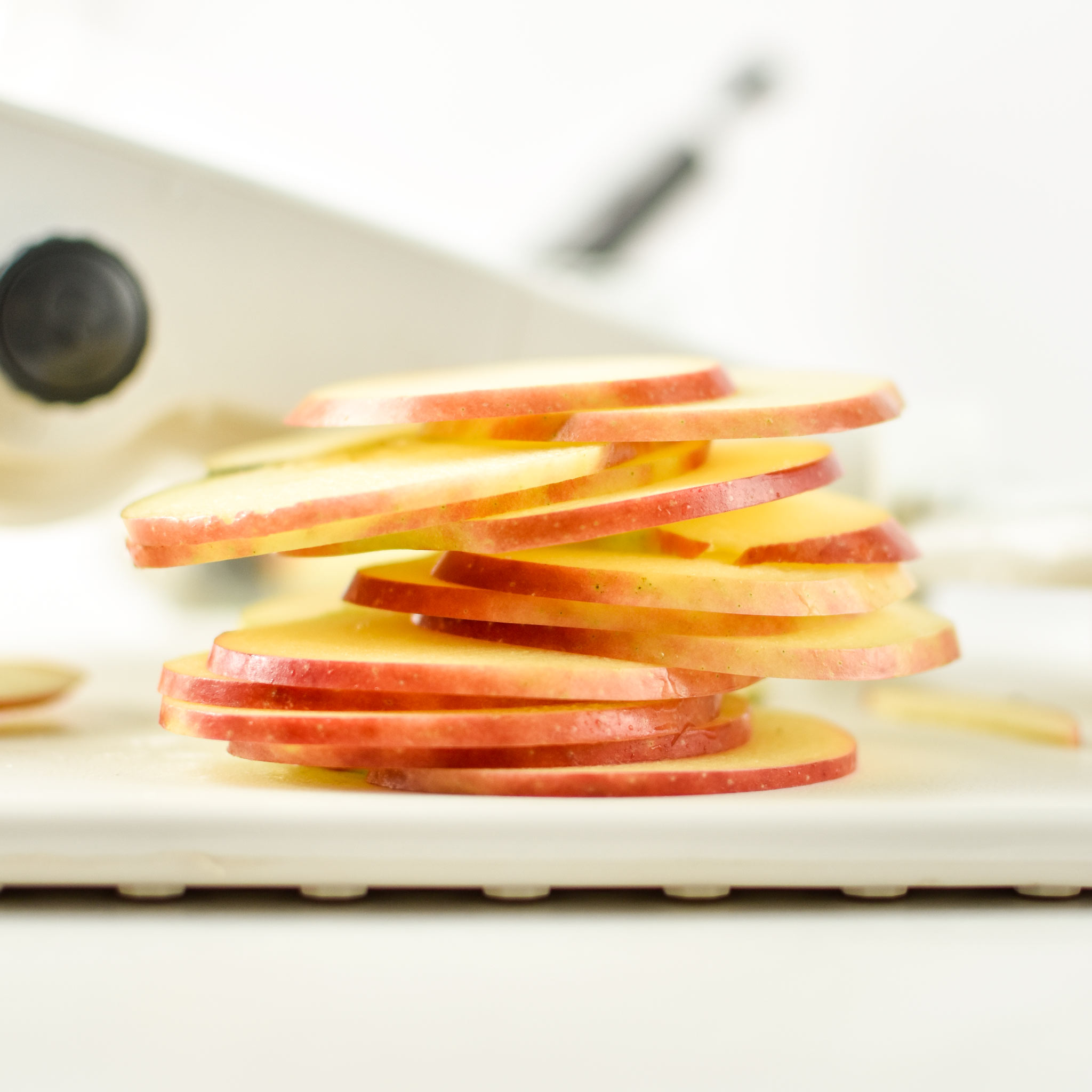 Apples sliced with the mandoline for how to make apples in an air fryer