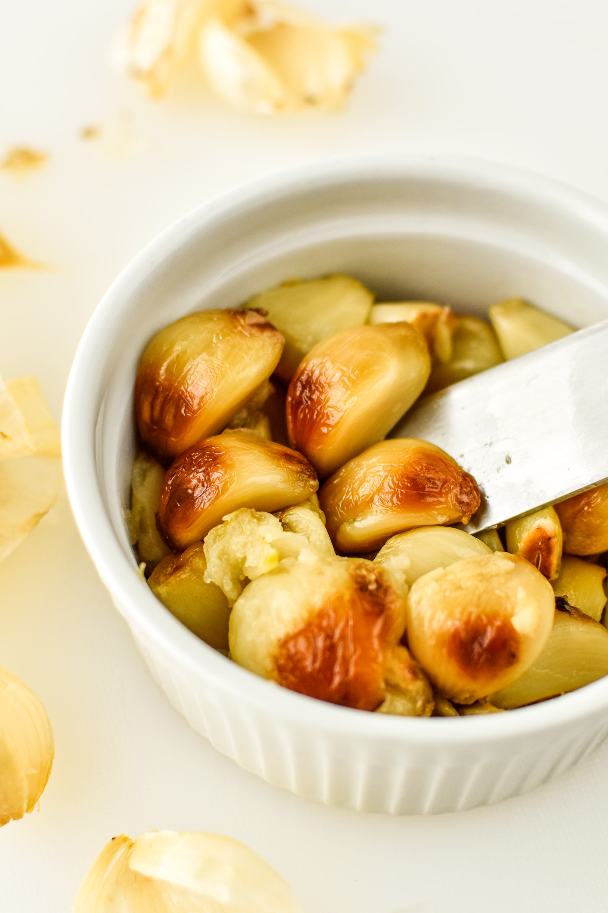 Roasted garlic made in the air fryer. Mash it up for an excellent bread topping!