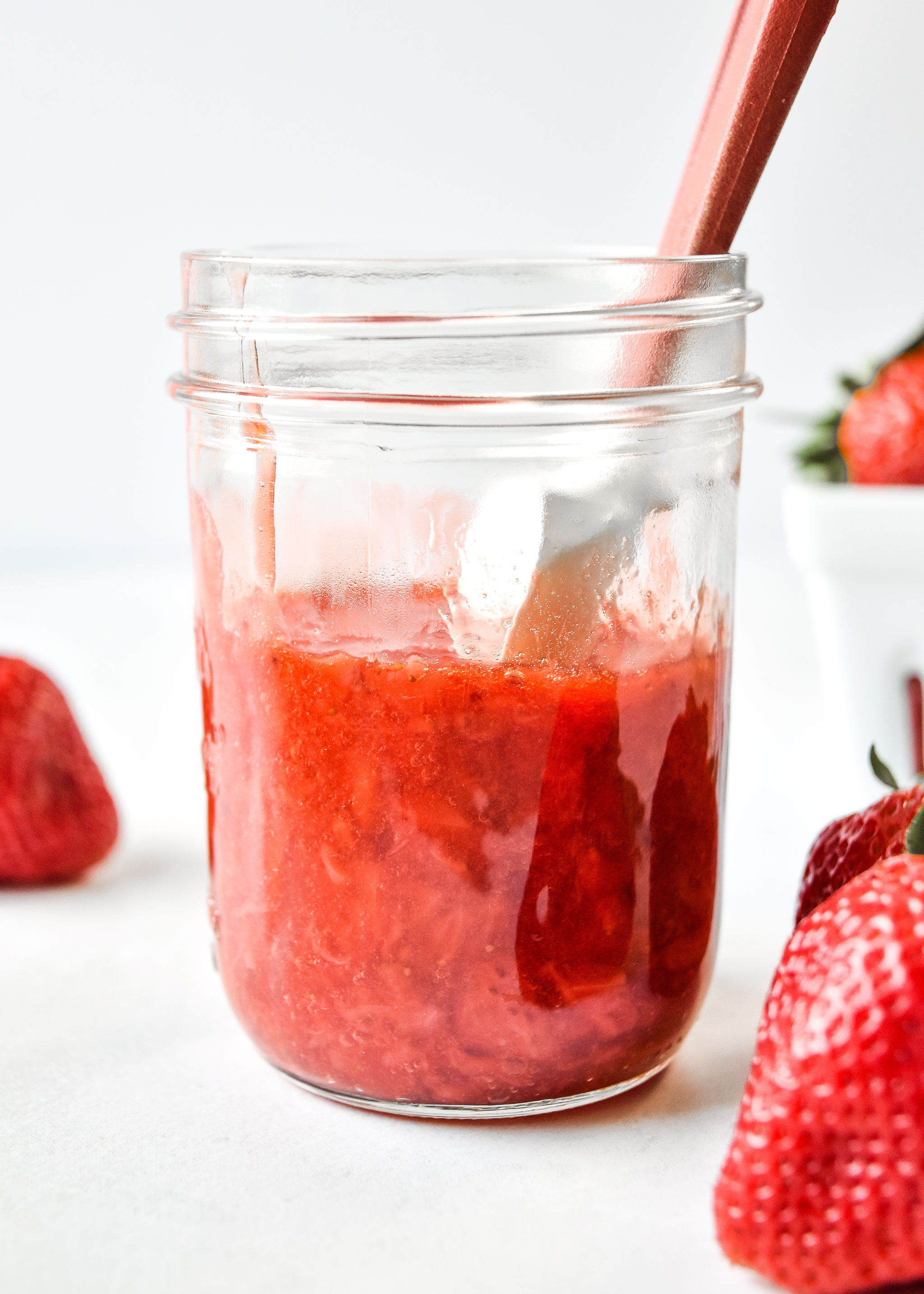 easy strawberry sauce in a mason jar