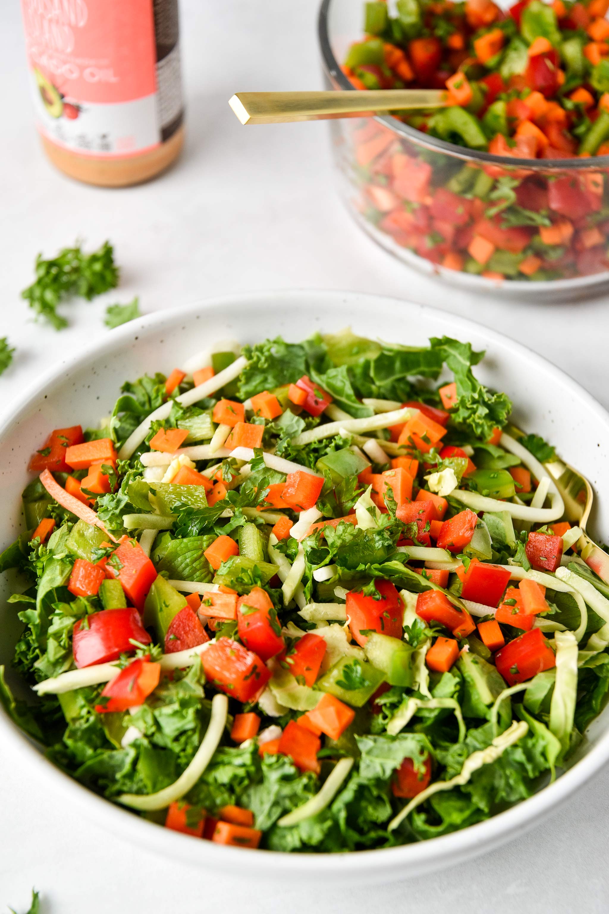a green salad with vegetable confetti