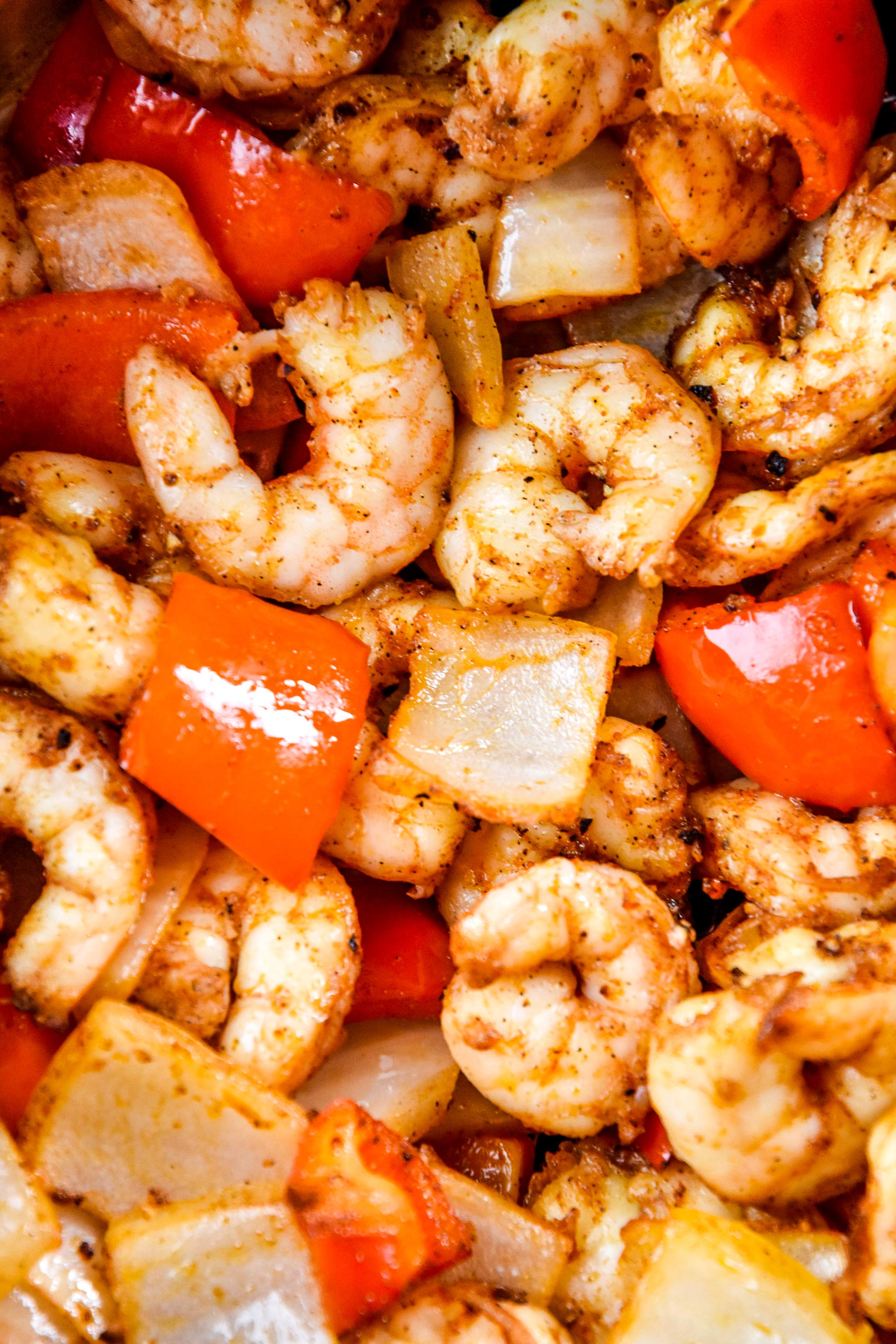 close up of the shrimp, bell peppers and onions