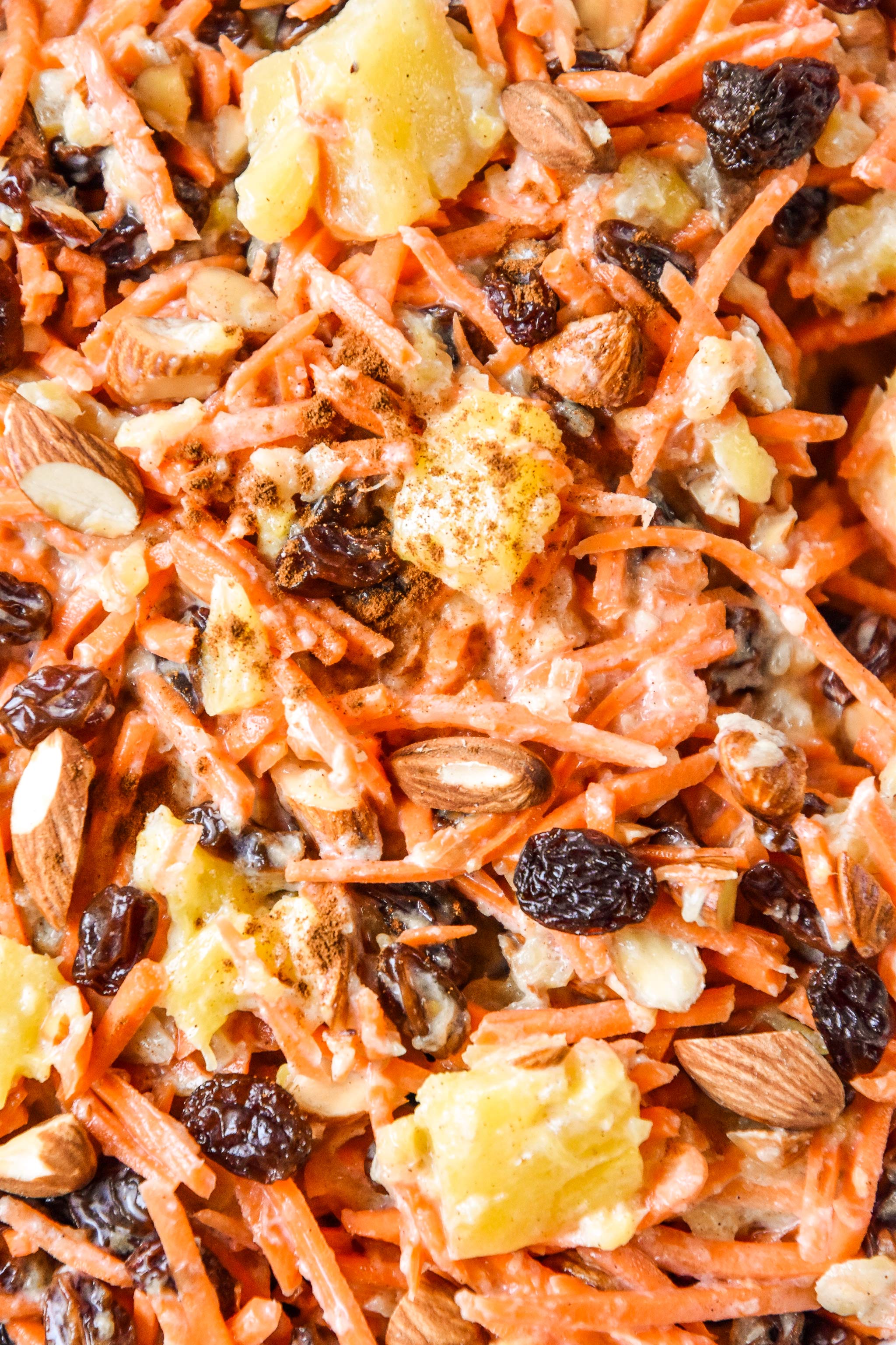 close up of the cinnamon raisin carrot salad in a bowl