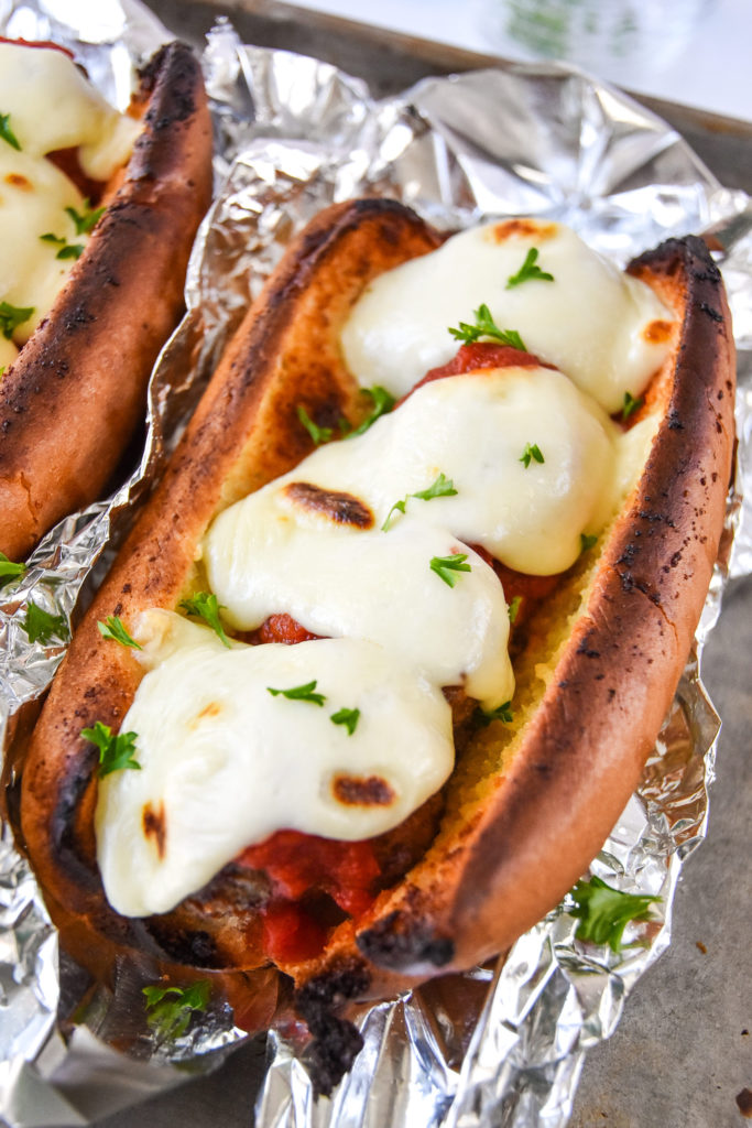 meatball sub sandwich with melted mozzarella cheese.