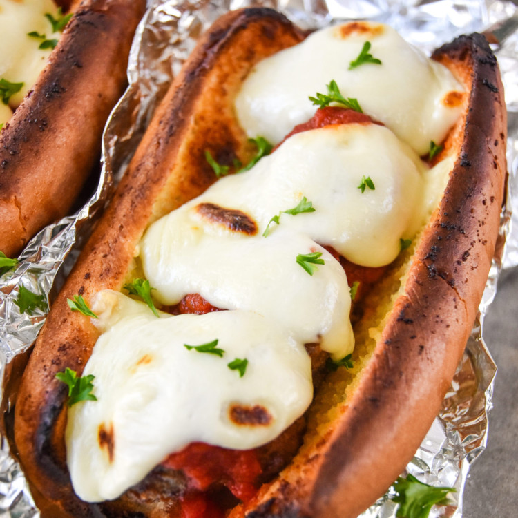 meatball sub sandwich with melted mozzarella cheese.