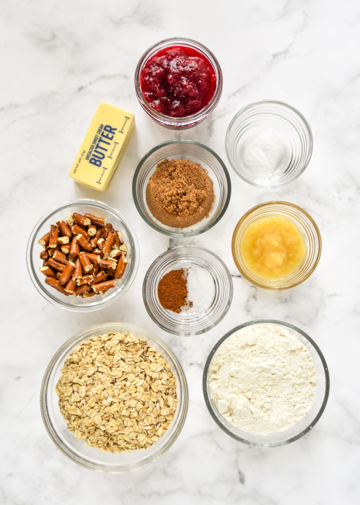ingredients on a table for the cranberry pretzel oat crumble bars.