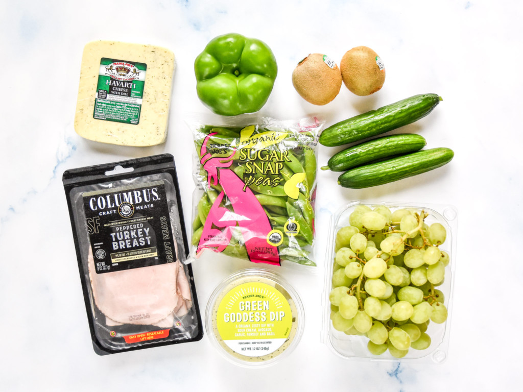 ingredients for the green food lunch box meal prep laid out on a counter before preparing.