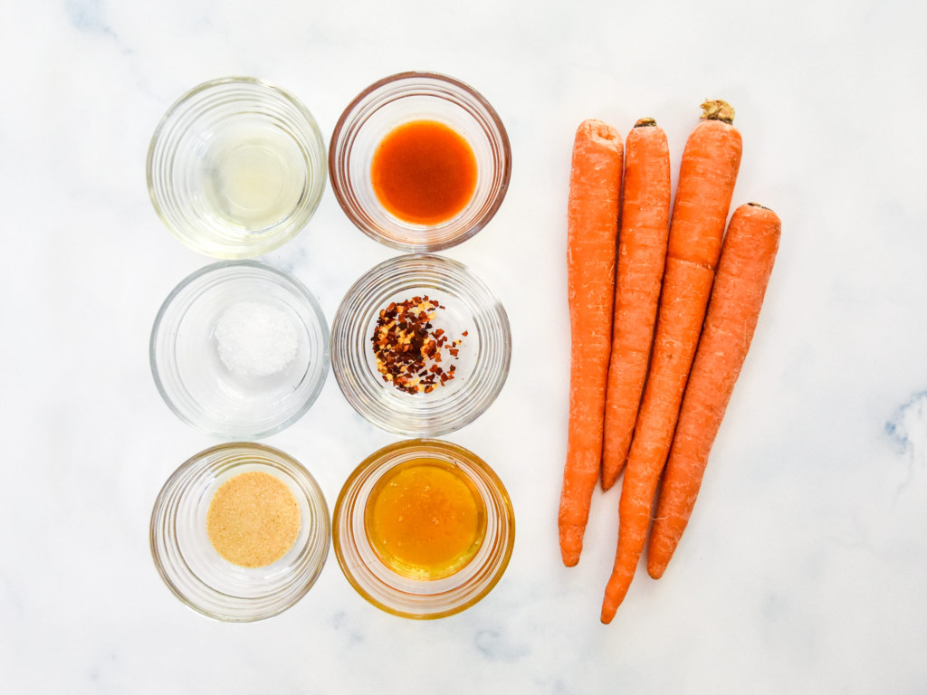 ingredients laid out before cooking for the air fryer hot honey glazed carrots.