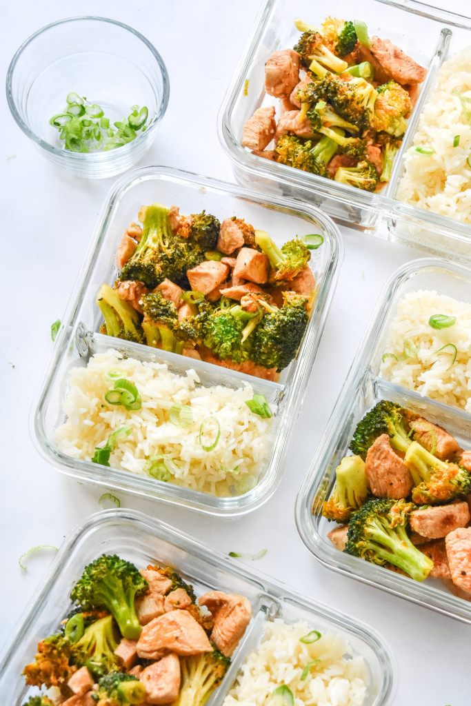 buffalo chicken and broccoli meal prep bowls with rice in glass containers.