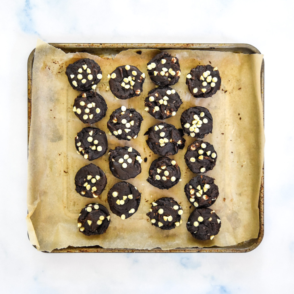 sweet potato brownie bites on a sheet pan lined with parchment.