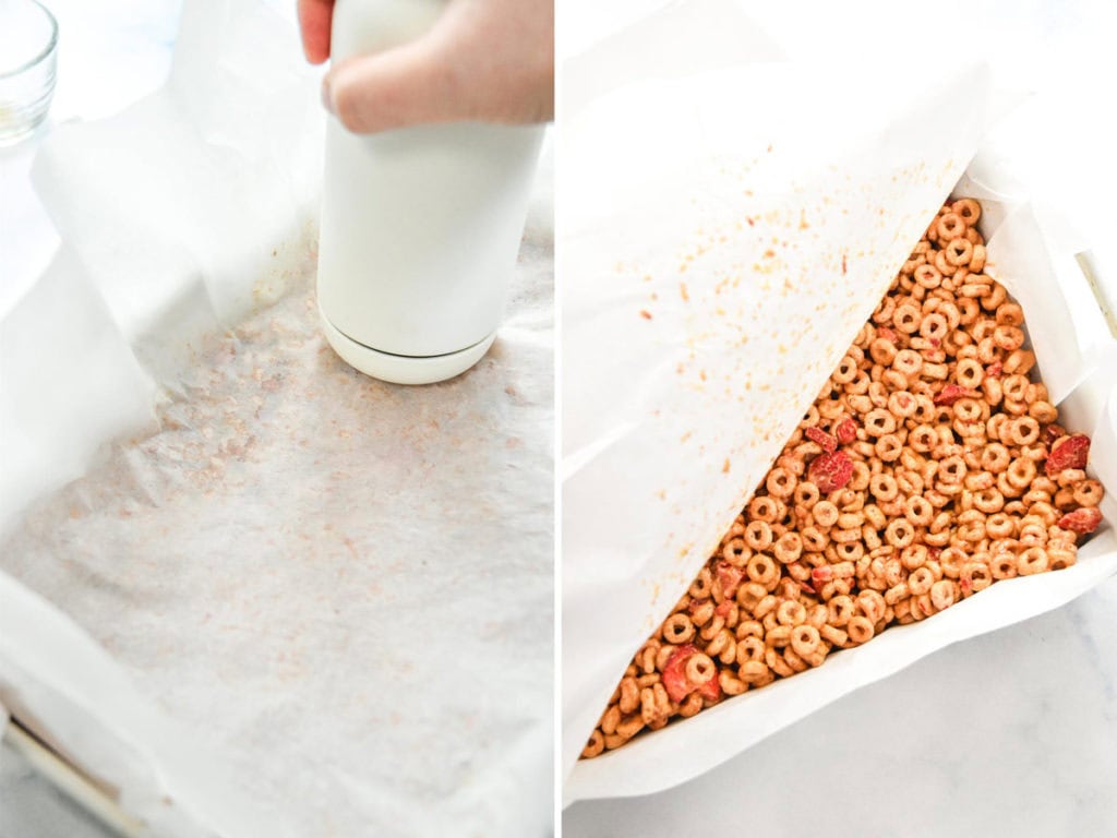 pressing the cereal into the pan with a piece of parchment paper on top.