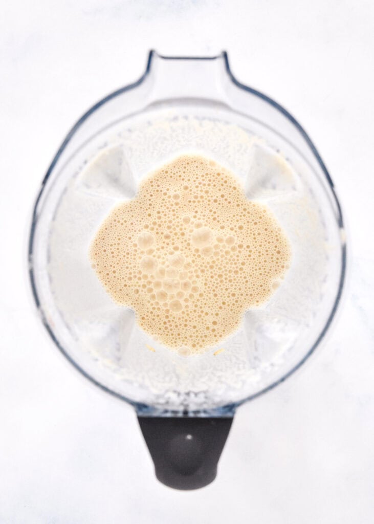 blended up apple pie smoothie in a vitamix blender.