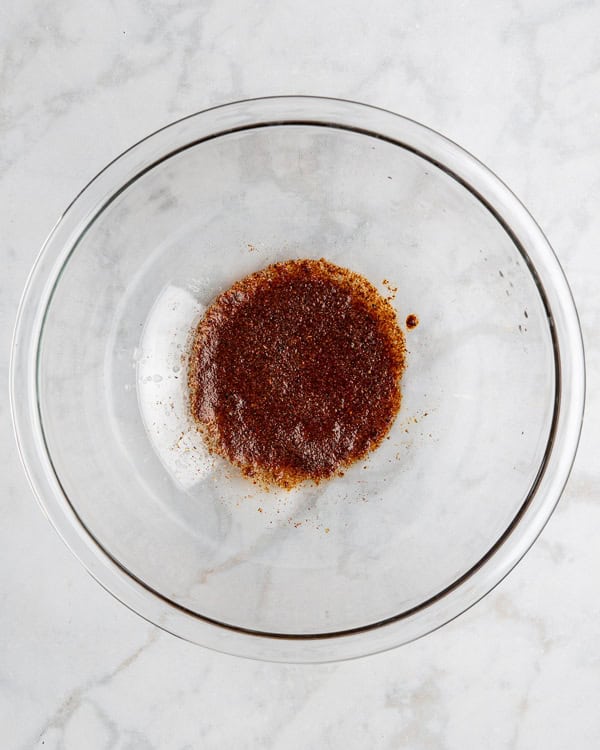 chicken fajita spice paste in a glass mixing bowl. 