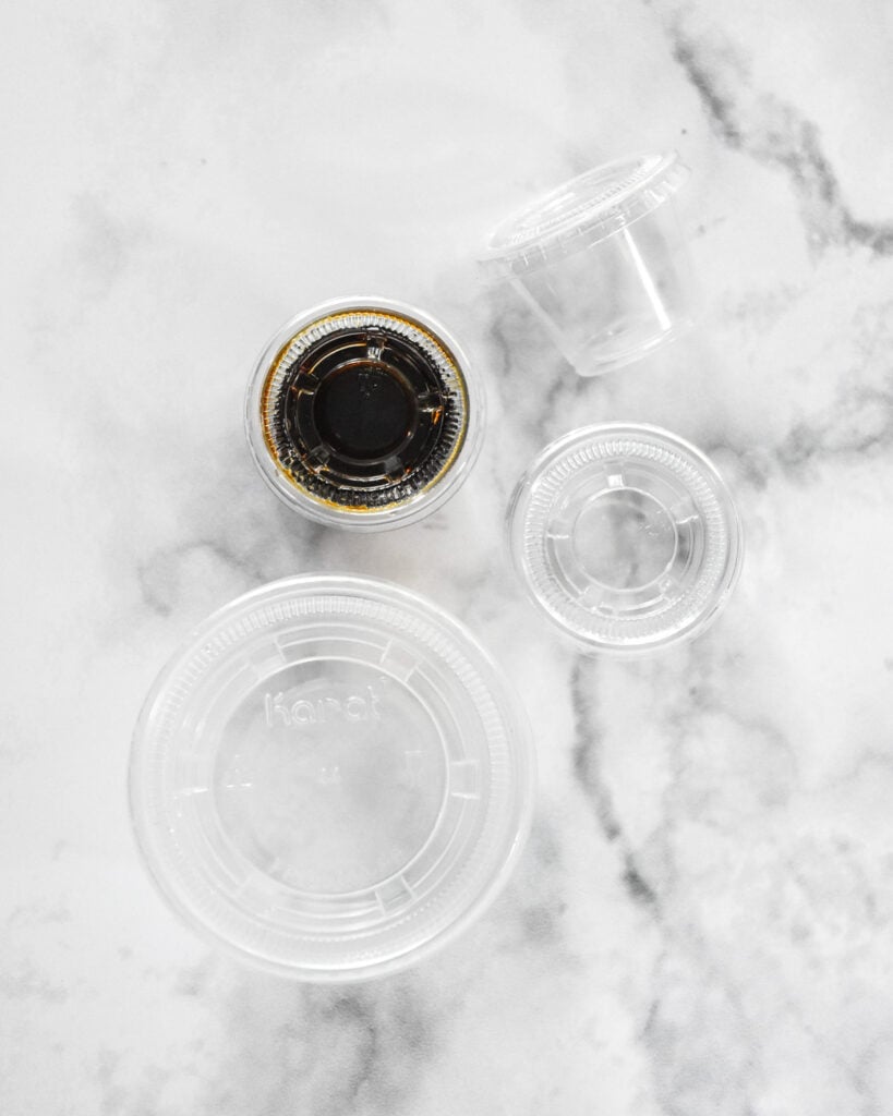 plastic sauce cups of various sizes.