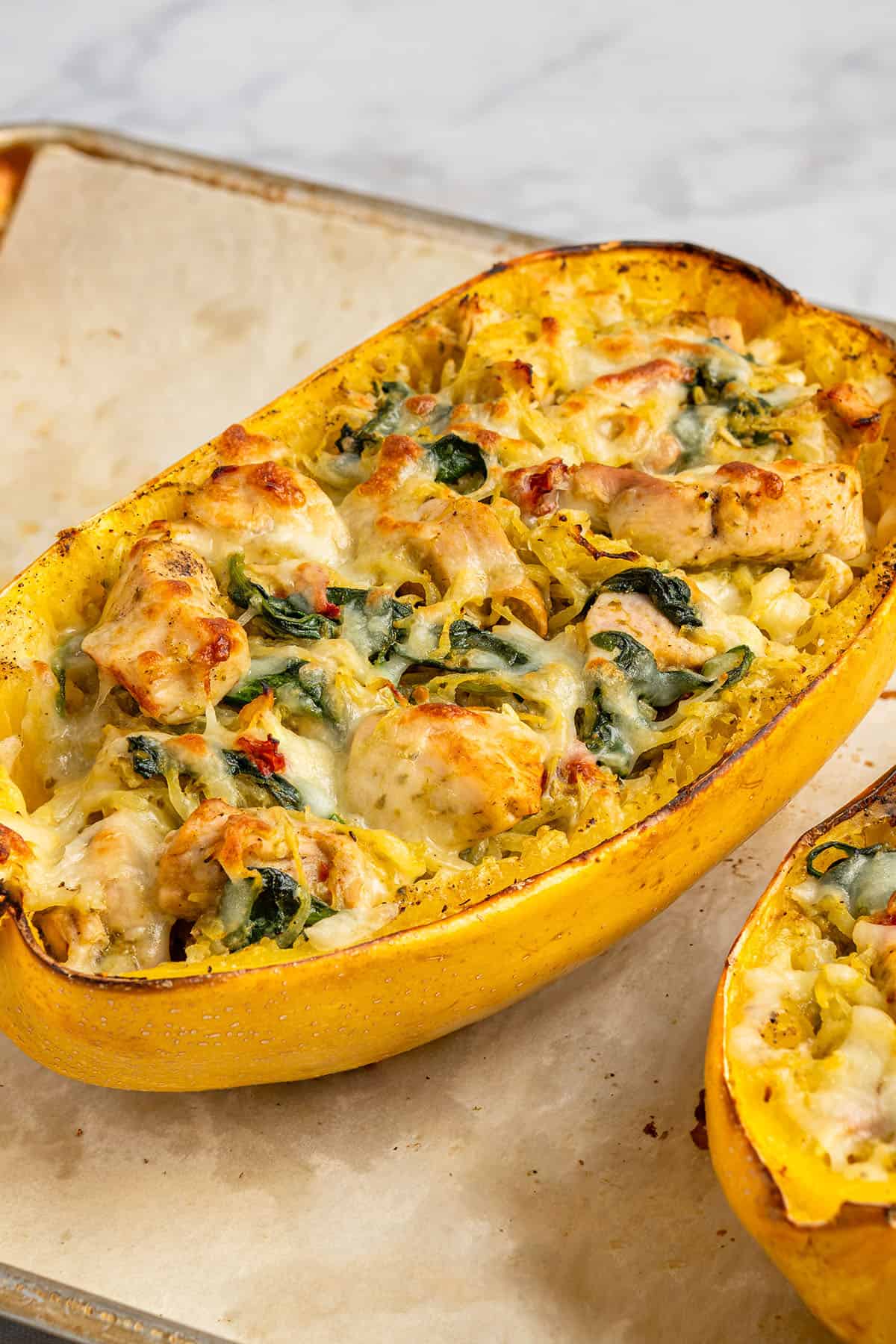Pesto Chicken Stuffed Spaghetti Squash